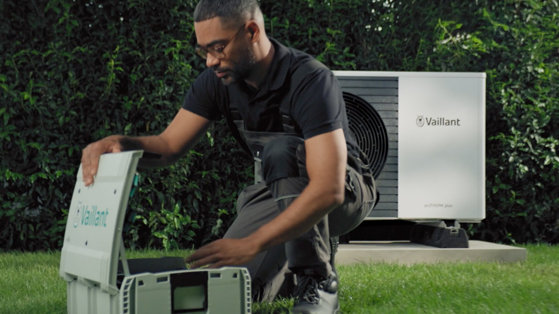 Installer looking into his toolbox